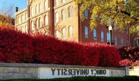 West View of QU Sign and Francis Hall